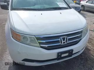 2011 Honda Odyssey EX-L with VIN 5FNRL5H60BB026171, listed as a IAAI auction lot 42511296 with 288,827 mi miles and . Bid and sale history available at DreamBid. Image 6.