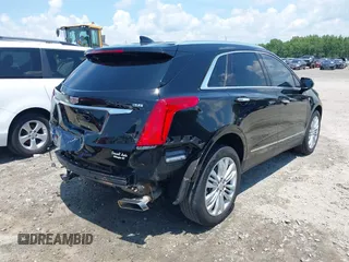 2018 Cadillac XT5 Premium Luxury AWD z VIN 1GYKNFRS3JZ112459, wystawiony jako IAAI lot #42590258 z przebiegiem 157 377 mil mil oraz . Historia ofert i sprzedaży dostępna na DreamBid. Obrazek 4.