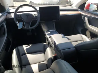 2024 Tesla Model Y с VIN 7SAYGDEDXRF008898, выставлен на аукционе Copart как лот 53741935 с пробегом 15 277 миль миль и Списание • Salvage title. История ставок и продаж доступна на DreamBid. Изображение 8.