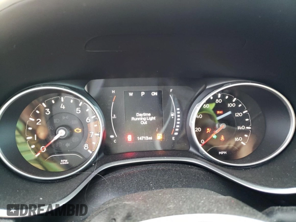2019 Jeep Compass Latitude with VIN 3C4NJDBB9KT827915, listed as a Copart auction lot 85757104 with 14,713 mi miles and Salvage Title. Bid and sale history available at DreamBid. Image 9.