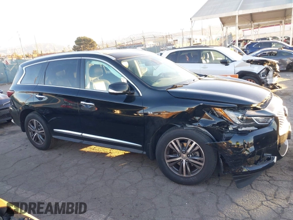 2020 Infiniti QX60 Pure with VIN 5N1DL0MNXLC505914, listed as a IAAI auction lot 41336979 with 53,813 mi miles and . Bid and sale history available at DreamBid. Image 13.