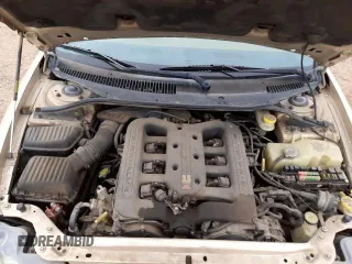 1999 Chrysler LHS z VIN 2C3HC56G0XH233303, wystawiony jako Copart lot #42642835 z przebiegiem 124 887 mil mil oraz Tytuł czysty. Historia ofert i sprzedaży dostępna na DreamBid. Obrazek 8.