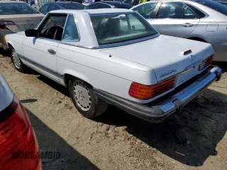1989 Mercedes-Benz 560 with VIN WDBBA48D0KA098625, listed as a Copart auction lot 73863784 with 30,648 mi miles and Salvage Title. Bid and sale history available at carsss.com. Image 2.