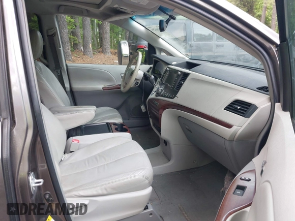 2011 Toyota Sienna XLE AAS with VIN 5TDYK3DC8BS016319, listed as a IAAI auction lot 42186294 with 293,401 mi miles and . Bid and sale history available at DreamBid. Image 5.