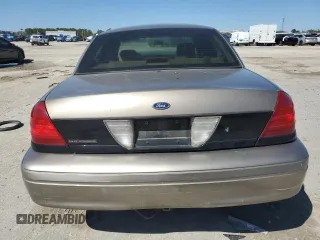 2003 Ford Police Interceptor Street Appear z VIN 2FAFP71W03X104811, wystawiony jako Copart lot #49307995 z przebiegiem 242 937 mil mil oraz Szkoda całkowita • Salvage title. Historia ofert i sprzedaży dostępna na DreamBid. Obrazek 6.