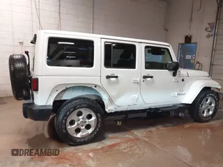 2014 Jeep Wrangler Unlimited Sahara with VIN 1C4BJWEG1EL326605, listed as a IAAI auction lot 41325037 with 135,824 mi miles. Bid and sale history available at carsss.com. Image 13.