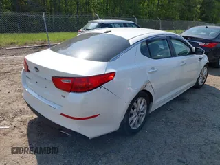 2014 Kia Optima LX with VIN KNAGM4A76E5454542, listed as a IAAI auction lot 42006510 with 192,291 mi miles and . Bid and sale history available at carsss.com. Image 4.