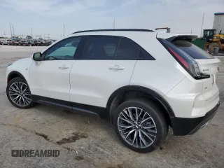 2024 Cadillac XT4 AWD Sport с VIN 1GYFZFR47RF125557, выставлен на аукционе Copart как лот 70869104 с пробегом 8 714 миль миль и Списание • Salvage title. История ставок и продаж доступна на DreamBid. Изображение 2.