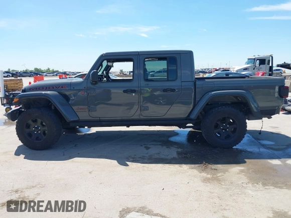 2021 Jeep Gladiator Mojave with VIN 1C6JJTEG8ML515686, listed as a IAAI auction lot 42217590 with 38,506 mi miles and . Bid and sale history available at DreamBid. Image 15.