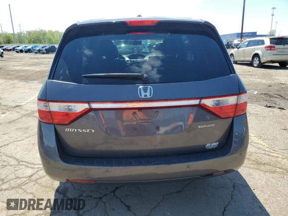 2012 Honda Odyssey Touring with VIN 5FNRL5H90CB093963, listed as a Copart auction lot 55434725 with 202,867 mi miles and Salvage Title. Bid and sale history available at DreamBid. Image 6.