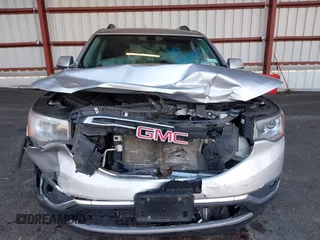 2017 GMC Acadia SLE with VIN 1GKKNLLS7HZ291097, listed as a IAAI auction lot 40665634 with 76,860 mi miles. Bid and sale history available at carsss.com. Image 6.