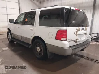2003 Ford Expedition Special Service z VIN 1FMPU16L63LB50445, wystawiony jako IAAI lot #41445377 z przebiegiem 206 264 mil mil oraz . Historia ofert i sprzedaży dostępna na DreamBid. Obrazek 3.
