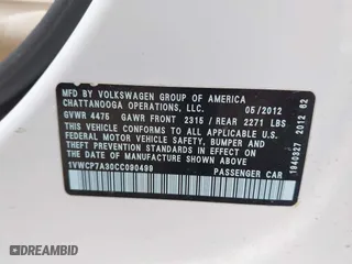 2012 Volkswagen Passat SEL with VIN 1VWCP7A30CC090499, listed as a IAAI auction lot 42037393 with 174,582 mi miles. Bid and sale history available at carsss.com. Image 9.