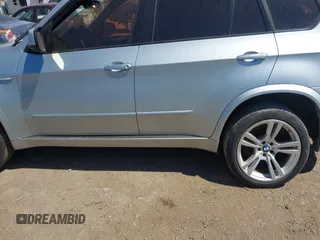 2011 BMW X5 M with VIN 5YMGY0C53BLK26167, listed as a IAAI auction lot 41742529 with 118,777 mi miles. Bid and sale history available at carsss.com. Image 14.