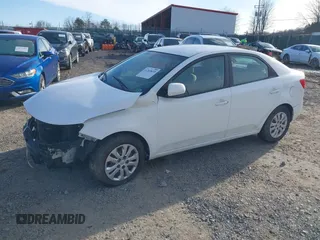 2011 Kia Forte LX with VIN KNAFT4A27B5434458, listed as a IAAI auction lot 41269635 with 238,721 mi miles. Bid and sale history available at carsss.com. Image 2.