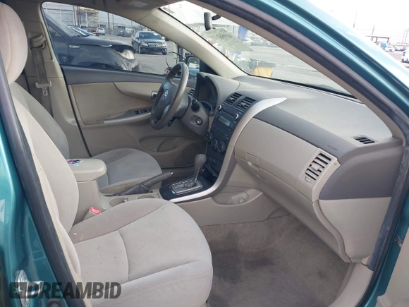 2010 Toyota Corolla with VIN JTDBU4EE4A9104965, listed as a IAAI auction lot 41956372 with 206,535 mi miles. Bid and sale history available at carsss.com. Image 5.