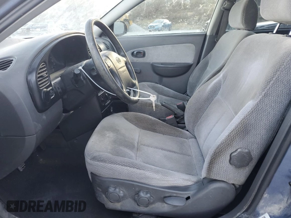 2003 Kia Spectra z VIN KNAFB121435232105, wystawiony jako Copart lot #88780695 z przebiegiem 161 466 mil mil oraz Szkoda całkowita • Salvage title. Historia ofert i sprzedaży dostępna na DreamBid. Obrazek 7.