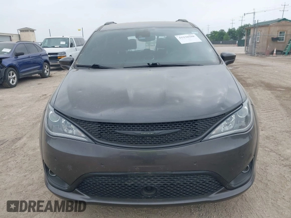 2020 Chrysler Pacifica Touring L with VIN 2C4RC1BG6LR247919, listed as a IAAI auction lot 41930508 with 66,952 mi miles and . Bid and sale history available at DreamBid. Image 12.