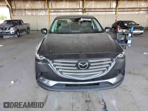 2021 Mazda CX-9 Touring z VIN JM3TCACYXM0520912, wystawiony jako Copart lot #60726695 z przebiegiem 36 506 mil mil oraz Szkoda całkowita • Salvage title. Historia ofert i sprzedaży dostępna na DreamBid. Obrazek 5.