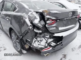 2019 Mazda 6 Grand Touring with VIN JM1GL1TYXK1505988, listed as a IAAI auction lot 41520952 with 70,032 mi miles and . Bid and sale history available at carsss.com. Image 6.
