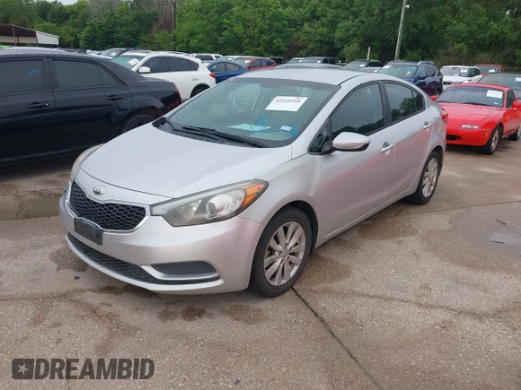 2014 Kia Forte LX with VIN KNAFX4A63E5099825, listed as a IAAI auction lot 42119316 with 174,551 mi miles and . Bid and sale history available at carsss.com. Image 2.