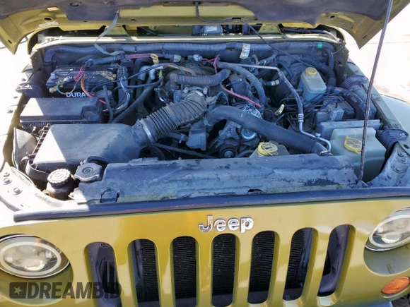 2007 Jeep Wrangler Unlimited Sahara z VIN 1J4GB591X7L165493, wystawiony jako Copart lot #47468205 z przebiegiem Nie podano mil oraz Czysty tytuł • Clean title. Historia ofert i sprzedaży dostępna na DreamBid. Obrazek 11.