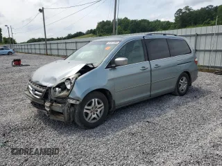 2005 Honda Odyssey EX-L z VIN 5FNRL38765B088756, wystawiony jako Copart lot #57071365 z przebiegiem 243 277 mil mil oraz Szkoda całkowita • Salvage title. Historia ofert i sprzedaży dostępna na DreamBid. Obrazek 1.
