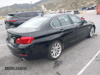 2015 BMW 5 Series 535i with VIN WBA5B1C55FD922761, listed as a IAAI auction lot 42021799 with 118,592 mi miles and . Bid and sale history available at carsss.com. Image 4.