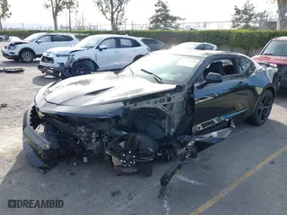 2018 Chevrolet Camaro 1SS with VIN 1G1FF1R79J0142369, listed as a IAAI auction lot 41399245 with 58,643 mi miles. Bid and sale history available at carsss.com. Image 2.