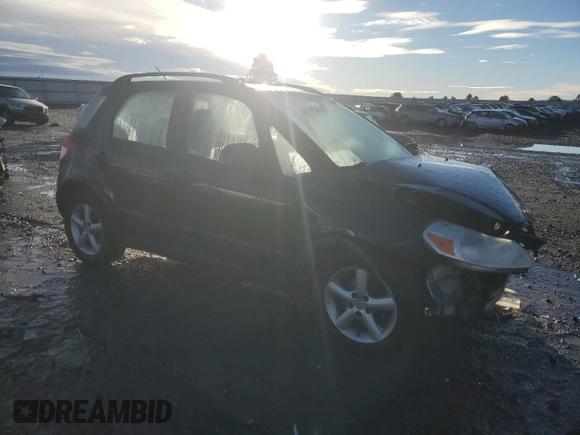 2009 Suzuki SX4 Man AWD with VIN JS2YB413896204560, listed as a Copart auction lot 84070084 with 128,015 mi miles and Salvage Title. Bid and sale history available at carsss.com. Image 4.