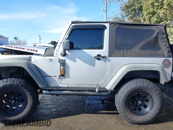 2011 Jeep Wrangler Rubicon with VIN 1J4BA6D10BL514776, listed as a IAAI auction lot 41487396 with 172,208 mi miles. Bid and sale history available at carsss.com. Image 15.