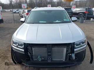 2018 Volkswagen Atlas SE with VIN 1V2KR2CA6JC560411, listed as a IAAI auction lot 41887472 with 168,155 mi miles and . Bid and sale history available at DreamBid. Image 13.