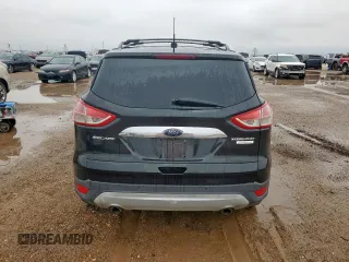 2014 Ford Escape Titanium с VIN 1FMCU0J90EUA04690, выставлен на аукционе Copart как лот 58421735 с пробегом 200 743 миль миль и Чистый • Clean title. История ставок и продаж доступна на DreamBid. Изображение 6.
