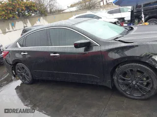 2018 Nissan Altima 2.5 SL with VIN 1N4AL3AP4JC288183, listed as a IAAI auction lot 41466582 with 100,858 mi miles. Bid and sale history available at carsss.com. Image 13.