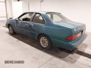 1993 Ford Tempo z VIN 1FAPP31X5PK229656, wystawiony jako IAAI lot #41788568 z przebiegiem 64 620 mil mil oraz . Historia ofert i sprzedaży dostępna na DreamBid. Obrazek 3.