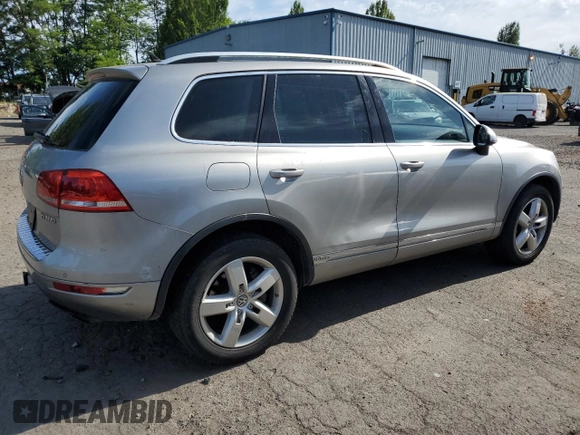 2012 Volkswagen Touareg с VIN WVGEG9BP6CD008533, выставлен на аукционе Copart как лот 60356345 с пробегом 103 270 миль миль и Чистый • Clean title. История ставок и продаж доступна на DreamBid. Изображение 3.