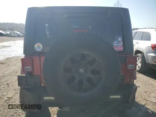 2012 Jeep Wrangler Unlimited Rubicon with VIN 1C4HJWFG4CL114089, listed as a Copart auction lot 49436495 with 189,079 mi miles and Salvage title. Bid and sale history available at DreamBid. Image 6.