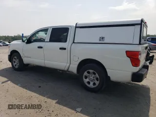 2017 Nissan Titan S with VIN 1N6AA1EJ2HN554628, listed as a Copart auction lot 60963515 with 137,574 mi miles and Salvage title. Bid and sale history available at DreamBid. Image 2.