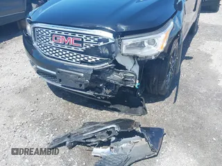 2019 GMC Acadia Denali with VIN 1GKKNXLS7KZ226863, listed as a IAAI auction lot 42070890 with 65,031 mi miles and . Bid and sale history available at DreamBid. Image 6.