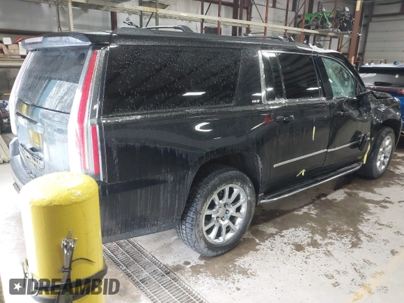 2015 GMC Yukon XL SLT with VIN 1GKS2HKC9FR175011, listed as a IAAI auction lot 41510519 with 194,136 mi miles. Bid and sale history available at carsss.com. Image 4.