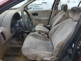 1998 Saturn SL z VIN 1G8ZK5271WZ179625, wystawiony jako Copart lot #50878255 z przebiegiem 180 085 mil mil oraz Szkoda całkowita • Salvage title. Historia ofert i sprzedaży dostępna na DreamBid. Obrazek 7.