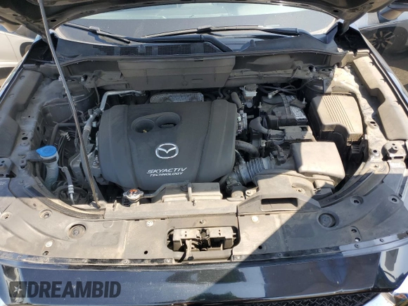 2018 Mazda CX-5 Grand Touring with VIN JM3KFBDM4J0348165, listed as a Copart auction lot 62733665 with 80,693 mi miles and Salvage title. Bid and sale history available at DreamBid. Image 11.
