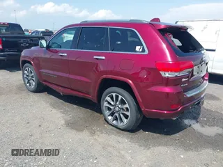 2017 Jeep Grand Cherokee Overland with VIN 1C4RJFCG7HC658943, listed as a IAAI auction lot 42282213 with 103,291 mi miles and . Bid and sale history available at DreamBid. Image 3.