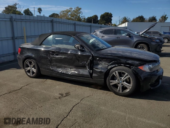 2009 BMW 1 Series 128i with VIN WBAUN13529VH81121, listed as a Copart auction lot 77849094 with 30,756 mi miles and Salvage Title. Bid and sale history available at DreamBid. Image 4.