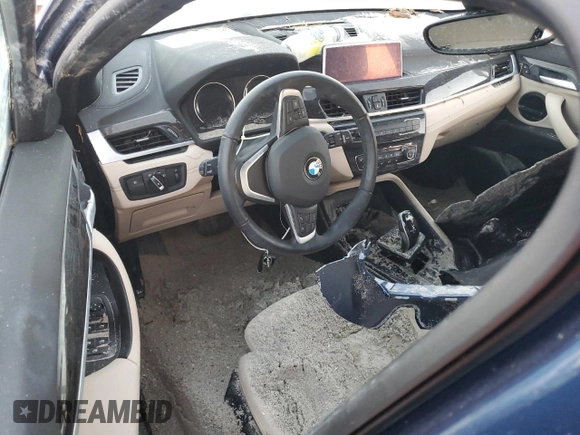 2021 BMW X2 sDrive28i with VIN WBXYH9C02M5S54591, listed as a Copart auction lot 77223834 with 0 mi miles and Salvage Title. Bid and sale history available at carsss.com. Image 8.
