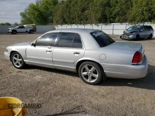 2003 Ford Crown Victoria LX z VIN 2FAFP74W03X122995, wystawiony jako Copart lot #55774415 z przebiegiem 234 485 mil mil oraz Czysty tytuł • Clean title. Historia ofert i sprzedaży dostępna na DreamBid. Obrazek 2.