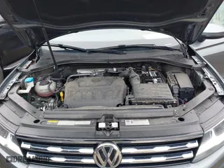 2020 Volkswagen Tiguan SE with VIN 3VV2B7AX2LM086678, listed as a IAAI auction lot 41694051 with 59,495 mi miles. Bid and sale history available at carsss.com. Image 10.