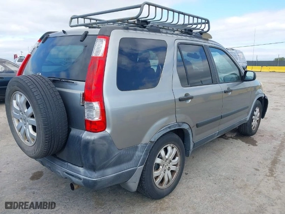 2005 Honda CR-V EX with VIN JHLRD78825C028681, listed as a IAAI auction lot 41890982 with 214,648 mi miles. Bid and sale history available at carsss.com. Image 4.
