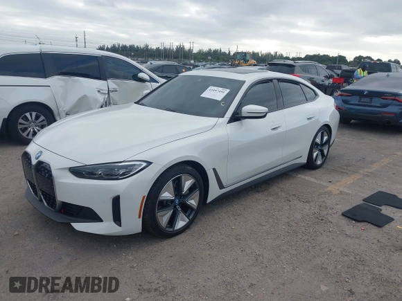 2023 BMW i4 eDrive40 z VIN WBY73AW02PFP24894, wystawiony jako IAAI lot #41097491 z przebiegiem 26 815 mil mil oraz . Historia ofert i sprzedaży dostępna na DreamBid. Obrazek 17.