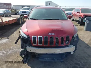 2015 Jeep Cherokee Limited with VIN 1C4PJMDSXFW577462, listed as a IAAI auction lot 41788083 with 155,120 mi miles and . Bid and sale history available at DreamBid. Image 13.